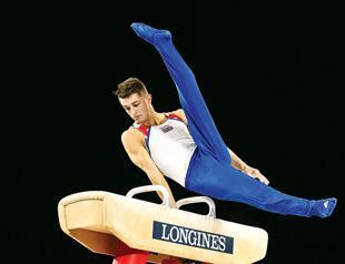 Britain’s Whitlock, Japan’s Shirai defend world titles