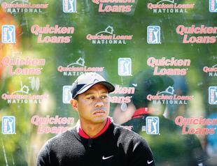 Tiger hitting ‘smooth iron shots’ in injury update