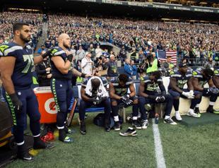 NFL wants players to stand for US anthem