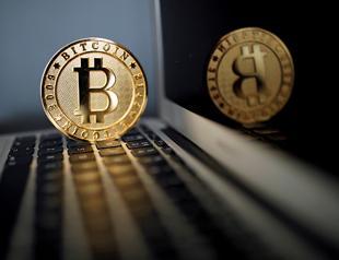 Bitcoin bursts through $5,000 for first time