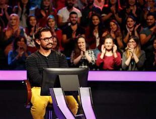 Bollywood star Khan donates money won in quiz show to refugees in Turkey