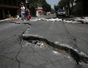 Insured losses from hurricanes, Mexico quakes $95 bln: Swiss Re estimate
