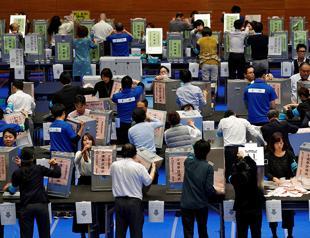 Abe sweeps to major win in Japan election