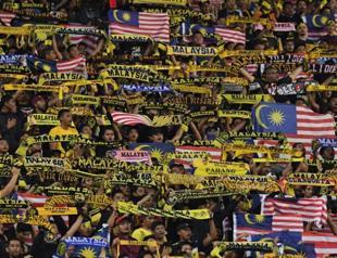 Malaysia fined $30,000 over dog chants