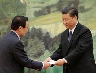 South Korea, China seek to warm frosty ties