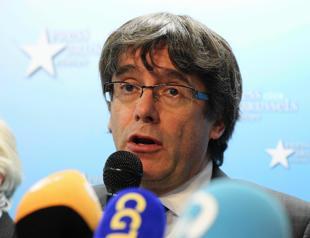 Spain likely to seek arrest of ousted Catalan leader, top judge says