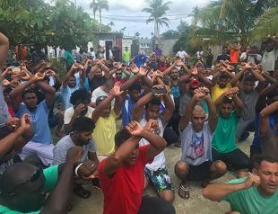 NZ offers help as Australia asylum protesters struggle in PNG camp