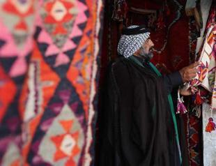 Traditional carpet weaving in central Iraq unravels