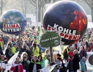 Thousands march against coal ahead of climate conference