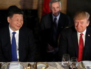 Trump visits Beijing amid mounting tensions over trade