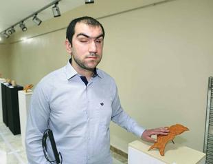 Blind Turkish artist sees the world through pottery