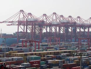 China’s trade surplus with US eases as Trump visits
