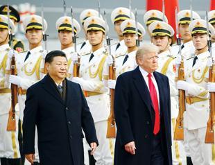 Trump presses China on North Korea and trade in Beijing