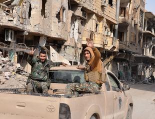 Syrian troops retake last ISIL urban stronghold of Albu Kamal