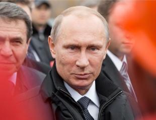 Putin accuses US of seeking payback election-stir