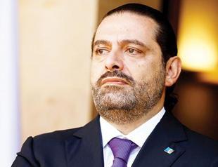 Hariri says free in Saudi and will return home ‘soon’