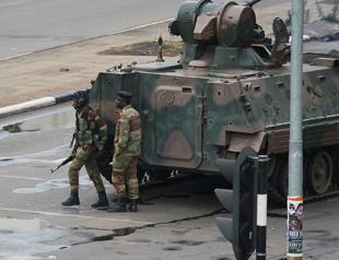 Zimbabwe’s army seizes power, targets ‘criminals’ around Mugabe