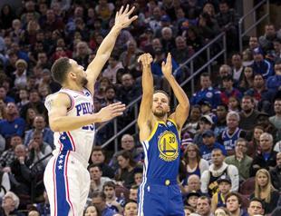 Curry leads Golden State fightback after 76ers blitz