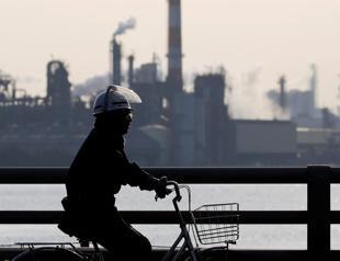 Japan trade surplus drops 40 percent in October