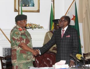 Impeachment looms as Mugabe refuses to quit