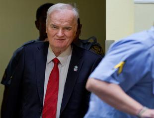 Mladic shouts at judges, gets dragged out of courtroom