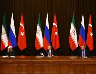 Turkey, Russia, Iran meet in bid to end war in Syria