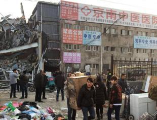 Chinas capital takes on illegal factory, warehouse flats