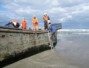 Japanese Coast Guard retrieves eight skeletonised bodies washed ashore