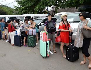 Indonesia re-opening Bali airport shut by volcanic ash