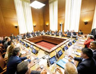 UN brings hard Syria talks under one roof, if not into one room