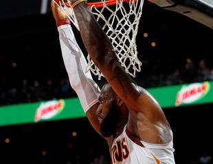 James leads Cavs to No.10, Irving sparks Celtics
