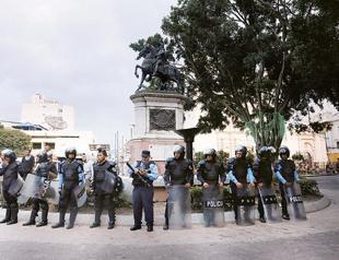 Honduran army enforces curfew after vote count stalls
