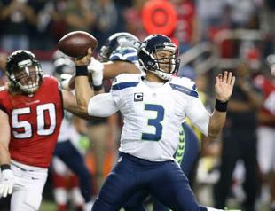 Wilson’s Seahawks cool off high-flying Falcons