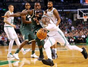 Irving, Celtics overpower Antetokounmpo