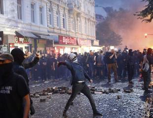 German police stage raids in probe of G20 summit violence