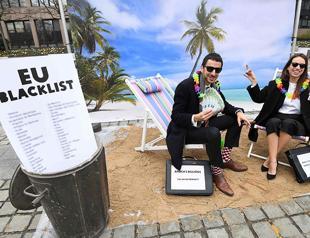 EU adopts tax haven blacklist, British territories spared