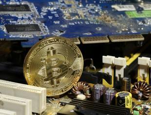 Bitcoin chalks up new record as it charges past $14,000