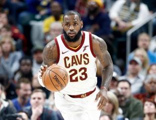 James carries Cavs, Clippers edge Wizards