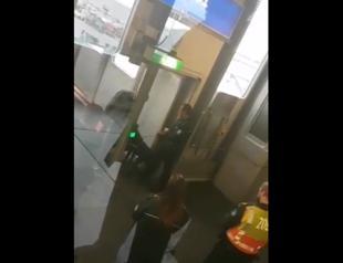 German police use dogs to search belongings of Turkish passengers