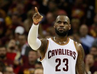 James takes another shot at Trump in Washington visit