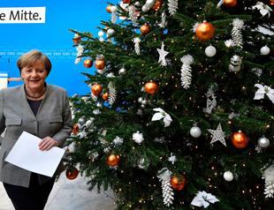 Merkel wants initial coalition deal with SPD by mid-January