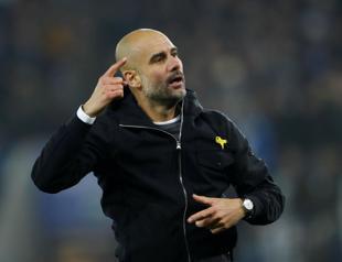 City coach Guardiola rules out 4 trophies
