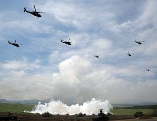 Japan OKs record arms spending that favors US equipment