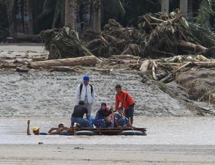 Rescuers search for Philippine storm victims as toll rises to 200