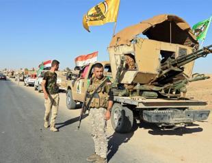 Iraqi Shiite paramilitaries deploy to Syrian border
