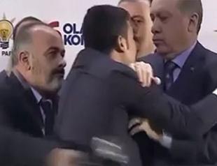 Erdoğan ‘hug’ stirs security debate