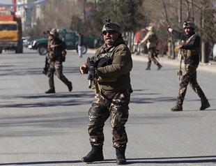 Blast at Afghan news agency in Kabul kills dozens