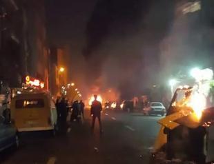 Ten dead in overnight Iran unrest as Rouhani strikes defiant note
