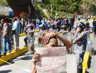 Caracas raises minimum wage despite high inflation