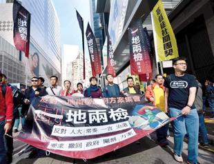 Anti-Beijing protesters march in Hong Kong